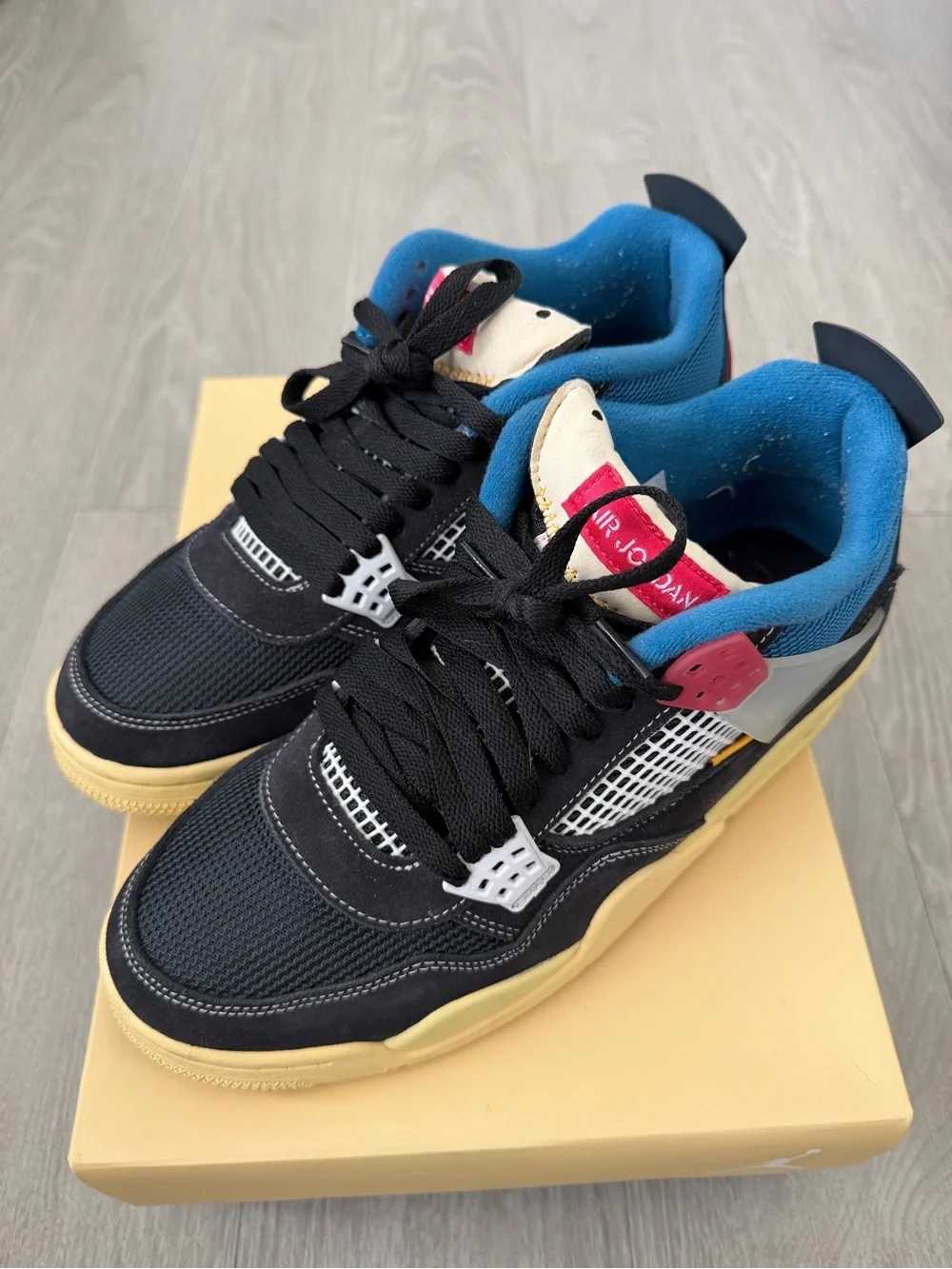 Jordan Men's Black, Blue & Cream Low-Top Sneakers with Pink Accents